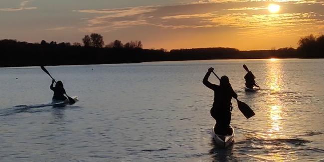 Girls Paddling in Fall